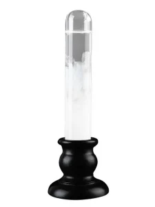 Barómetro de Fitzroy com tubo de vidro transparente, base preta e interior com líquido branco, usado para medir pressão atmosférica.