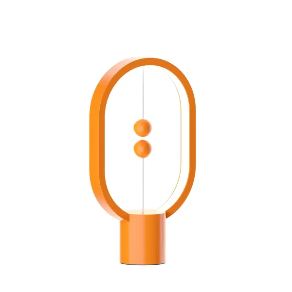 Lâmpada de mesa moderna em forma de oval laranja com dois botões no centro, ideal para decoração científica ou moderna.