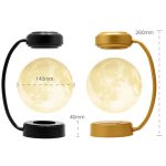 Candeeiro lunar com base preta e dourada, mostrando dimensões de 140mm de diâmetro e 260mm de altura, com detalhes de textura lunar realista.