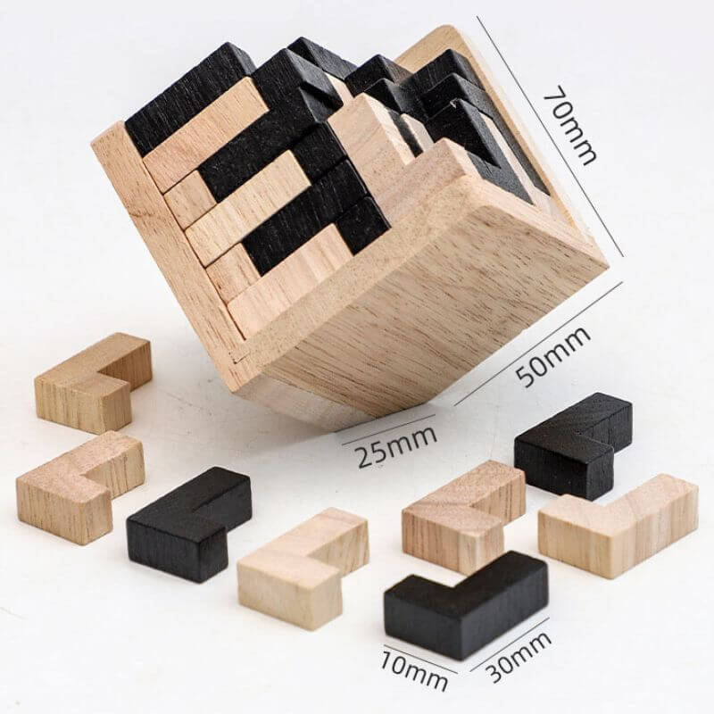 Peças de madeira de diferentes tamanhos e cores, formando um cubo de quebra-cabeças, com medidas indicadas de 25mm, 30mm, 10mm, 70mm e 50mm.