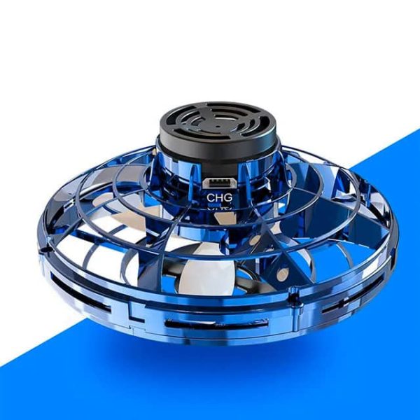 Drone de forma circular com estrutura de plástico azul transparente e componentes internos visíveis, incluindo motor e hélices, sobre fundo branco com detalhe azul.