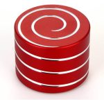 Giroscópio anti-stress vermelho com padrão de espiral branco na parte superior, empilhado em quatro unidades.