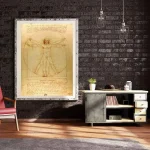 Reprodução do desenho de Leonardo da Vinci do Homem de Vitrúvio, com detalhes do corpo humano em proporções perfeitas, em moldura transparente.