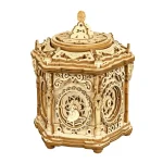 Caixa de música de madeira com detalhes intricados, mostrada de frente, com partes móveis visíveis e acabamento natural.