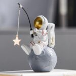 Estatueta Astronauta Pescador de Estrelas