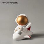 Estatueta de Astronauta em Foguetão