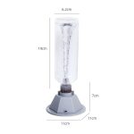 Tubo de água com tornado visível, base de suporte cinzenta, dimensões indicadas, usado em experimentos científicos educativos.