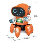 Robô dançarino com cabeça, braços e pernas articulados, luzes LED no peito e cabeça, com dimensões de 18cm de altura, 12.8cm de largura e 13.5cm de profundidade, em cores laranja, branco e preto.