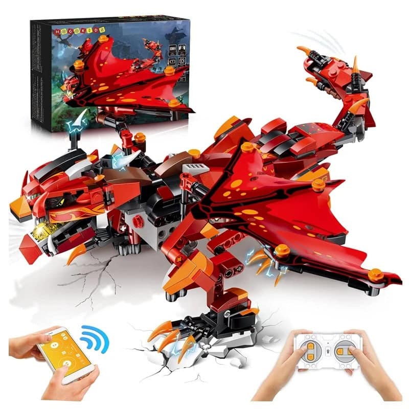 Robô de construção com asas de dragão Robô de construção com asas de dragão vermelho, garras afiadas e controle remoto, com caixa de embalagem ao fundo.