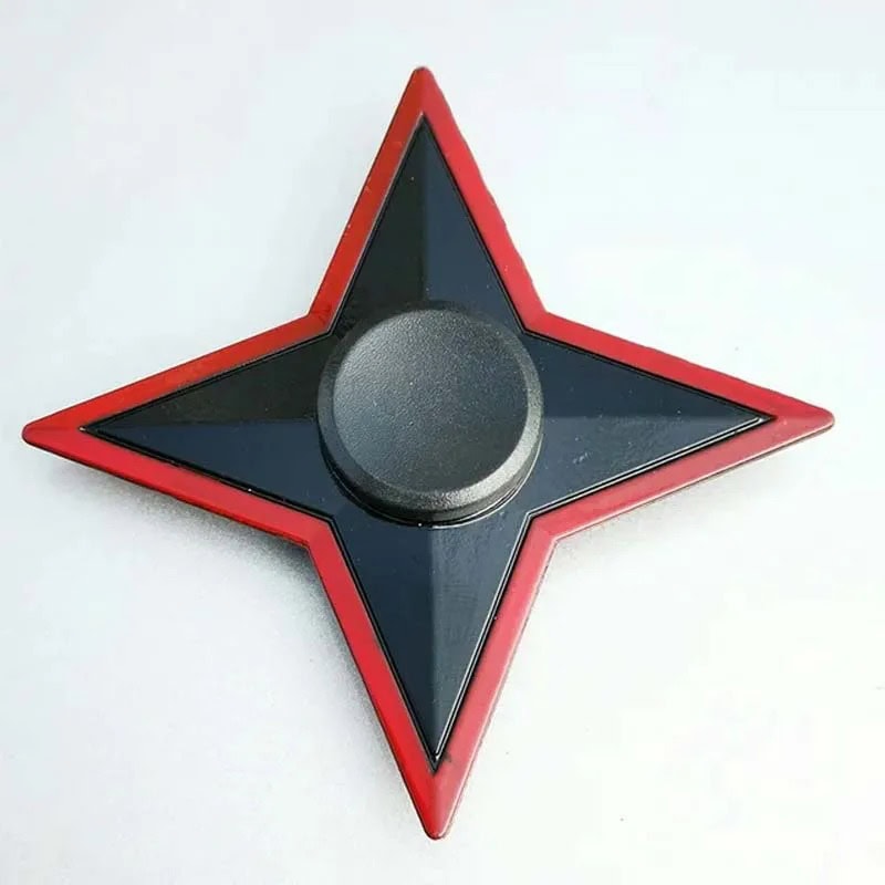 Spinner de mão estrela com partes pretas e vermelhas, com um botão central, visto de cima.