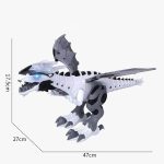Robô dinossauro branco com detalhes em preto e cinza, asas articuladas, olhos LED azuis, medindo aproximadamente 47cm de comprimento, 17,5cm de altura e 27cm de largura.