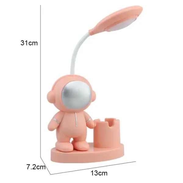 Luminária de personagem astronauta em cor rosa, com cabeça espelhada, braço articulado com luz, base circular e torre de observação.