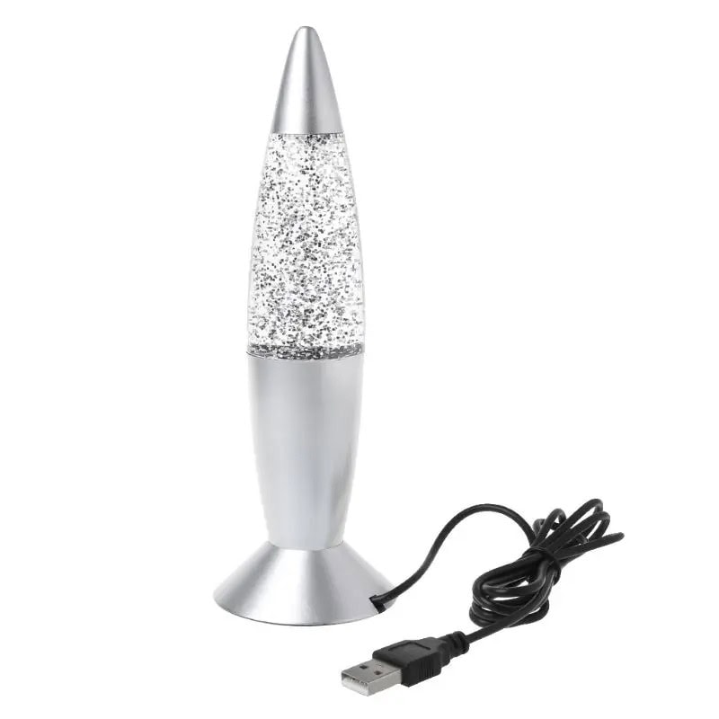 Lâmpada de lava com design de foguetão Lâmpada de lava em forma de foguetão com base metálica e luzes brilhantes, ligada a um cabo USB para alimentação.