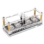 Conjunto de tubos de ensaio transparentes com suportes de madeira e componentes eletrónicos, usado para experiências científicas educativas.