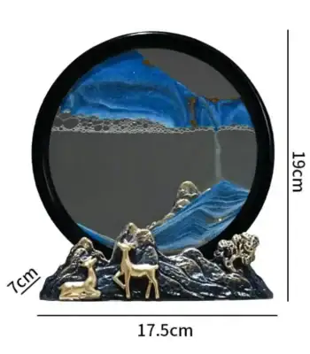 Relógio de mesa decorativo com esfera que simula água em movimento, rodeado por rochas e figuras de animais, medindo 19cm de altura e 17.5cm de largura.