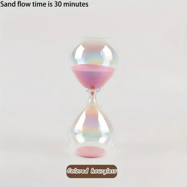 Relógio de areia com areia rosa e transparente, mostrando o fluxo de areia em 30 minutos, com fundo branco.