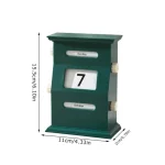 Relógio de calendário de mesa de madeira verde com exibição de dia, data e mês em janelas separadas, medindo aproximadamente 15,5 cm de altura e 11 cm de largura.