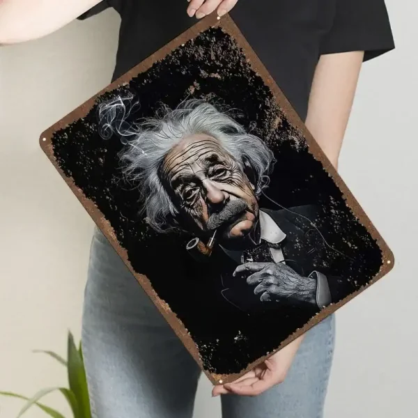 Quadro decorativo com retrato de Einstein, detalhes de tinta e efeito de pintura, em cores escuras e branco, com moldura de madeira.
