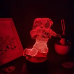 Lâmpada 3D de astronauta em posição de caminhada, iluminada em vermelho, com detalhes de wireframe visíveis, sobre base circular.