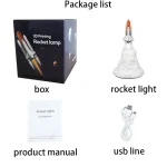 Conjunto de componentes para montar uma lanterna de foguete 3D, incluindo caixa, luz de foguete, manual de instruções e cabo USB.