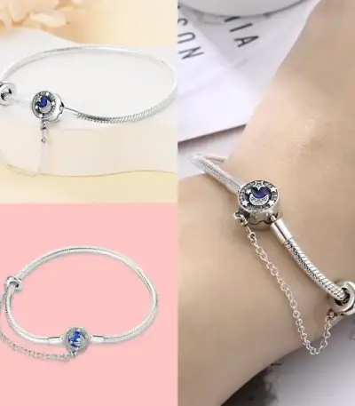 Bracelet en argent avec pendentif étoile et lune, parfait pour une touche élégante et cosmique.