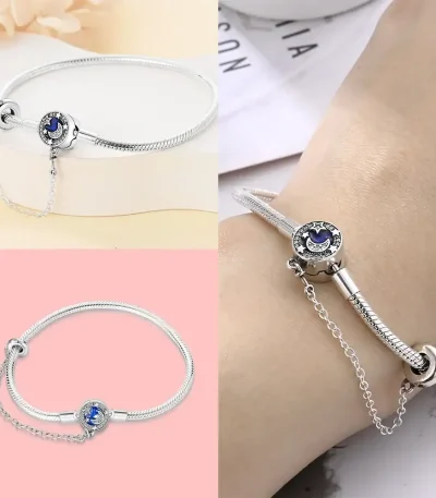 Pulseira de prata com pingente de estrela e lua, perfeita para um toque elegante e cósmico.