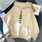 Roupa com capuz bege com padrões de planetas do sistema solar, ideal para os amantes de astronomia e decoração científica.