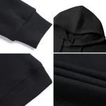 Roupas em tecido preto, incluindo uma camisola com capuz, um hoodie e um tecido de algodão, perfeitos para um estilo casual e confortável.