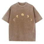 Vestuário camiseta com motivo de fases da lua em estilo vintage.