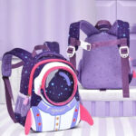 Sac à dos enfant avec motif astronaute et étoiles, idéal pour l'école ou les activités ludiques.
