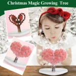 Árvore de Natal mágica em crescimento para crianças, decorativa e educativa, com coração em flores rosas, ideal para a decoração festiva e aprendizagem científica.