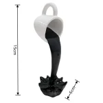Porta-caneca em forma de pá de carvão, com líquido preto simulando carvão em fusão, ideal para decoração científica ou como objeto inusitado.
