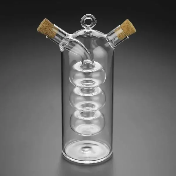 Vaso de vidro científico com duas rolhas de cortiça, ideal para a decoração ou utilização em laboratório. O seu design elegante e transparente faz dele um objeto decorativo único para os amantes de ciência.