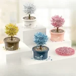 Árvore de cristal colorido em um vaso decorativo, perfeita para decoração interior ou como presente original. Disponível em várias cores vivas, este objeto científico alia estética e fascínio.