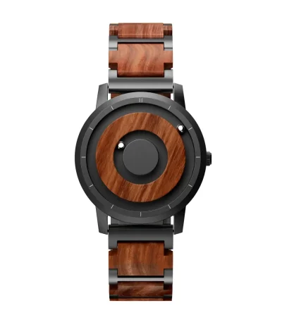 Relógio em madeira e metal com design moderno e sofisticado, combinando materiais naturais e acabamento elegante. Perfeito para um estilo único e ecológico.