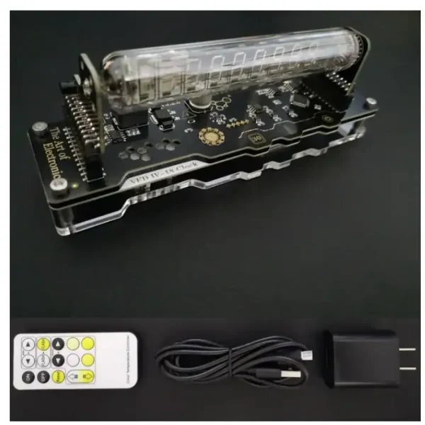 Painel de controle eletrônico com visor digital, controle remoto, cabo USB e adaptador de energia para experiências científicas.
