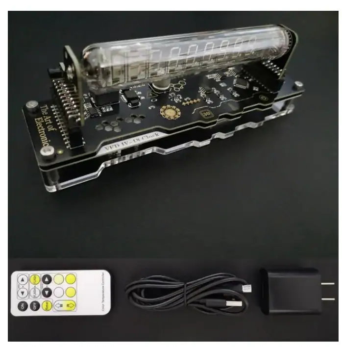 Painel de controle eletrônico com visor digital, controle remoto, cabo USB e adaptador de energia para experiências científicas.