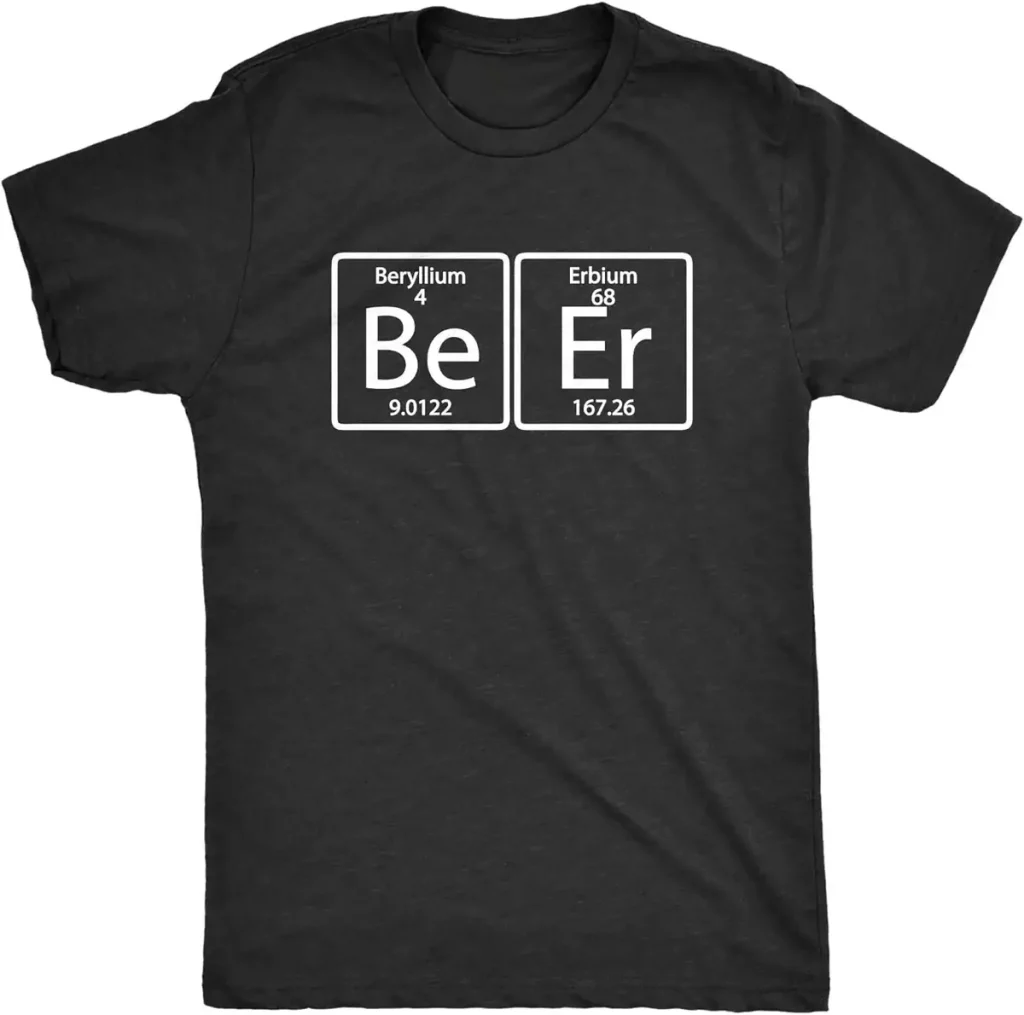 T-shirt preta com design científico representando os símbolos químicos de Berílio (Be) e Érbio (Er), ilustrando a fusão da ciência e da moda.