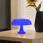 Lâmpada de decoração em forma de cogumelo em vidro azul, ideal para uma decoração original e moderna.