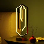 Lâmpada decorativa em forma de número 0 com iluminação LED quente, design contemporâneo, ideal para decoração interior científica ou moderna.