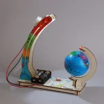 Modelo educativo com globo terrestre e experiência científica ilustrando a rotação da Terra, ideal para o aprendizado em sala de aula ou em casa.