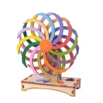 Modelo de roda de Newton em madeira pintada em cores vivas, ilustrando o princípio da conservação de energia por movimento rotativo.
