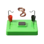 Dispositivo de demonstração de resistência elétrica com fios, terminais e placa de aquecimento para experiências científicas.