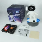 Robô nave espacial para crianças com projetor galáxia, entregue com caixa, cabo USB, manual e acessórios, ideal para o aprendizado lúdico do espaço.