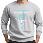 Pulôver com motivo de DNA e mensagem humorística sobre o desbloqueio dos genes.