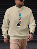 Sweatshirt com ilustração de planetas e astronautas, perfeito para amantes de ciência e astronomia. Confortável e na moda, ideal para um visual casual inspirado no universo.