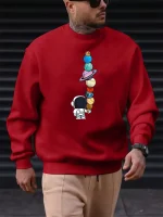 Sweatshirt vermelho com padrão de planetas e astronautas, estilo urbano e na moda, perfeito para amantes de ciência e astronomia.