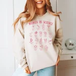Roupa confortável com ilustrações de mulheres famosas na ciência, perfeita para as apaixonadas por ciência e moda.