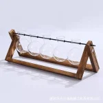 Copos para experiência científica em vidro com suporte de madeira, perfeitos para experiências educativas ou decorações de estilo científico.