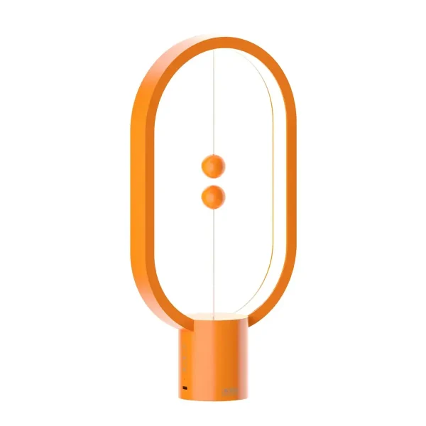 Lâmpada de mesa design em forma de oval laranja com dois botões para iluminação.
